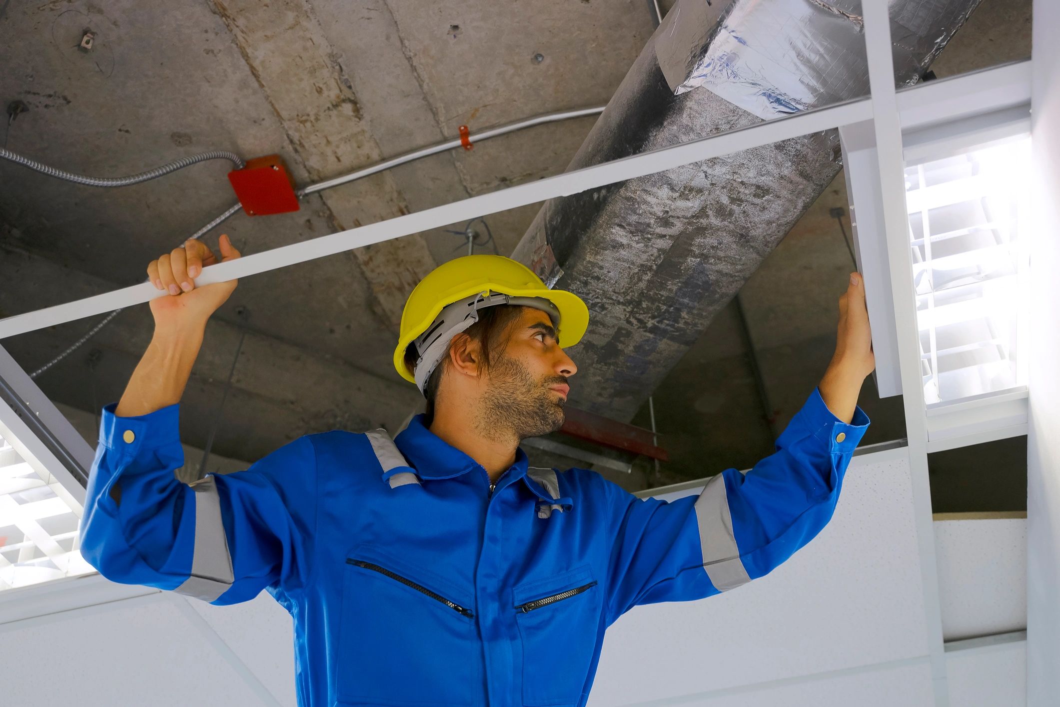 Technician working on insulation-related home improvement service