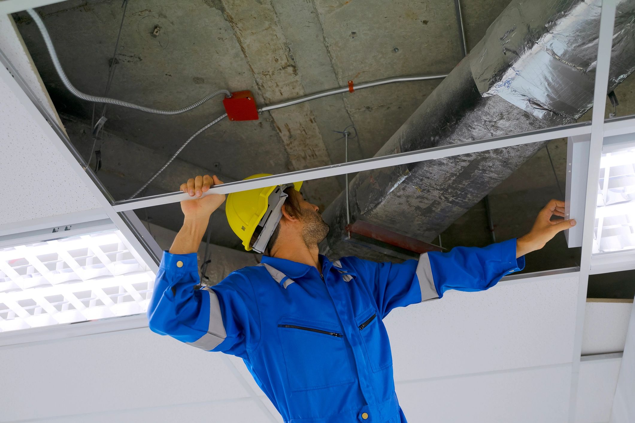 Pest control technician performing a property service visit