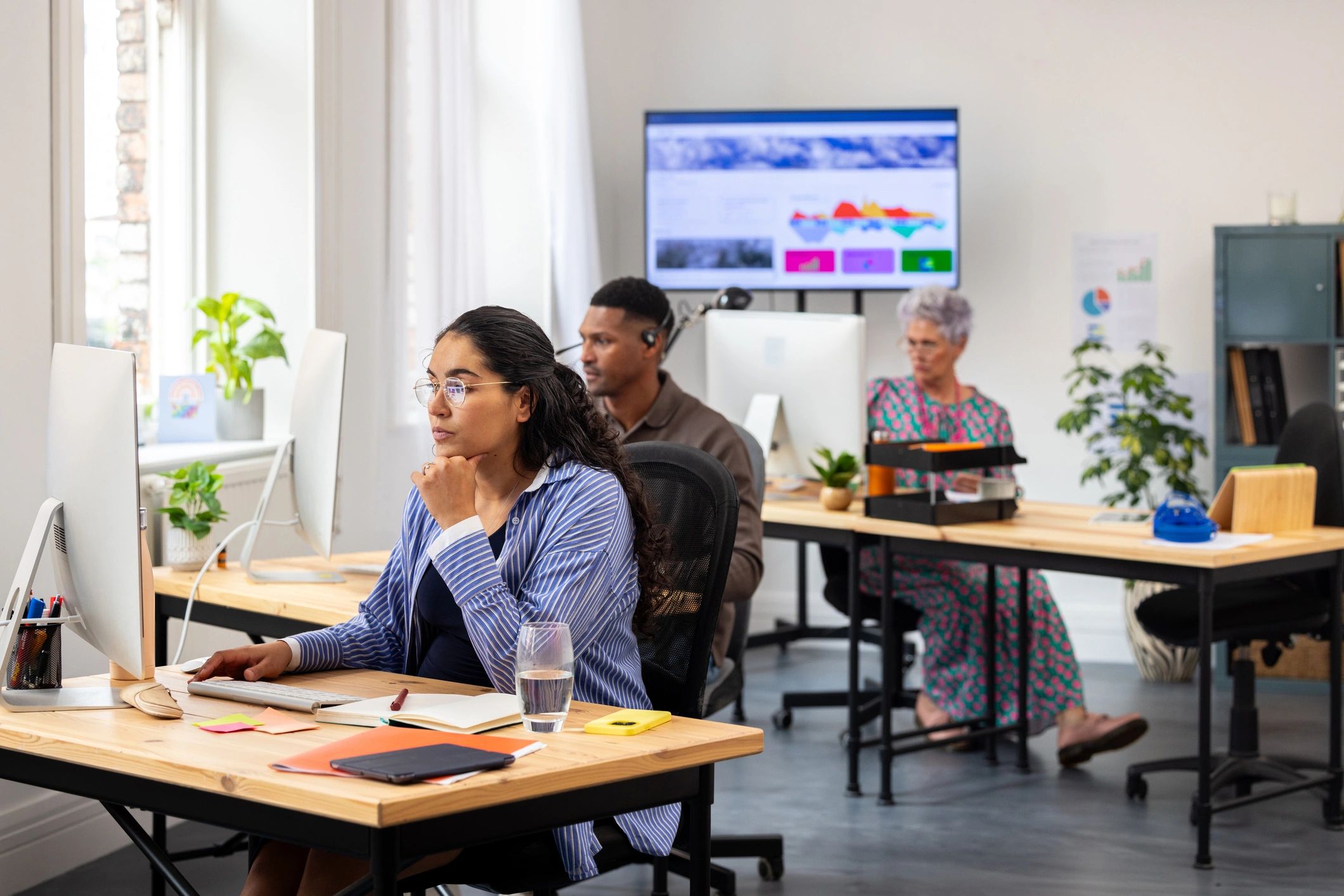 Professional customer support team in a modern office